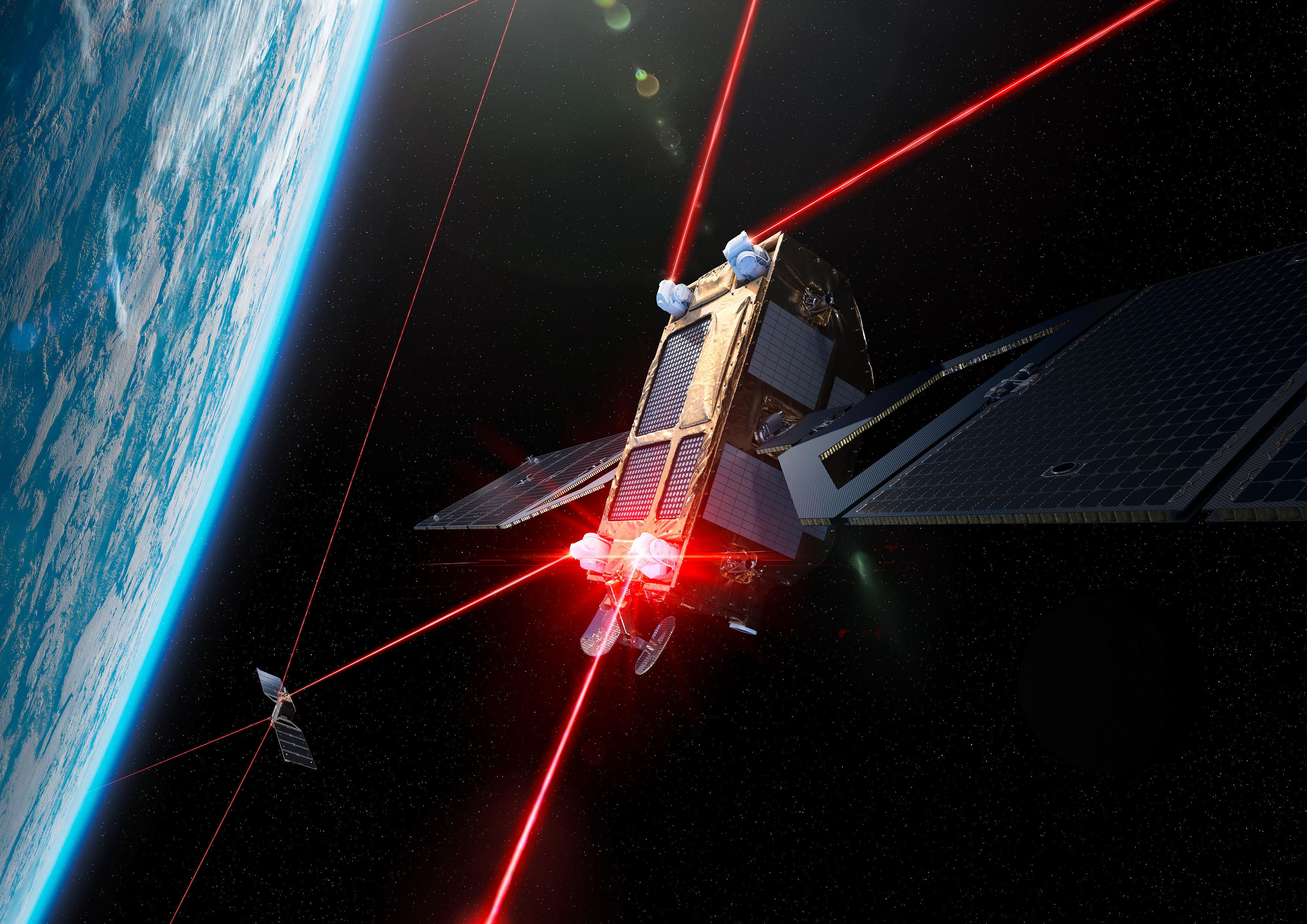 Mehrere Satelliten im All, die über rote Strahlen miteinander kommunizieren. Im Hintergrund die Erde.