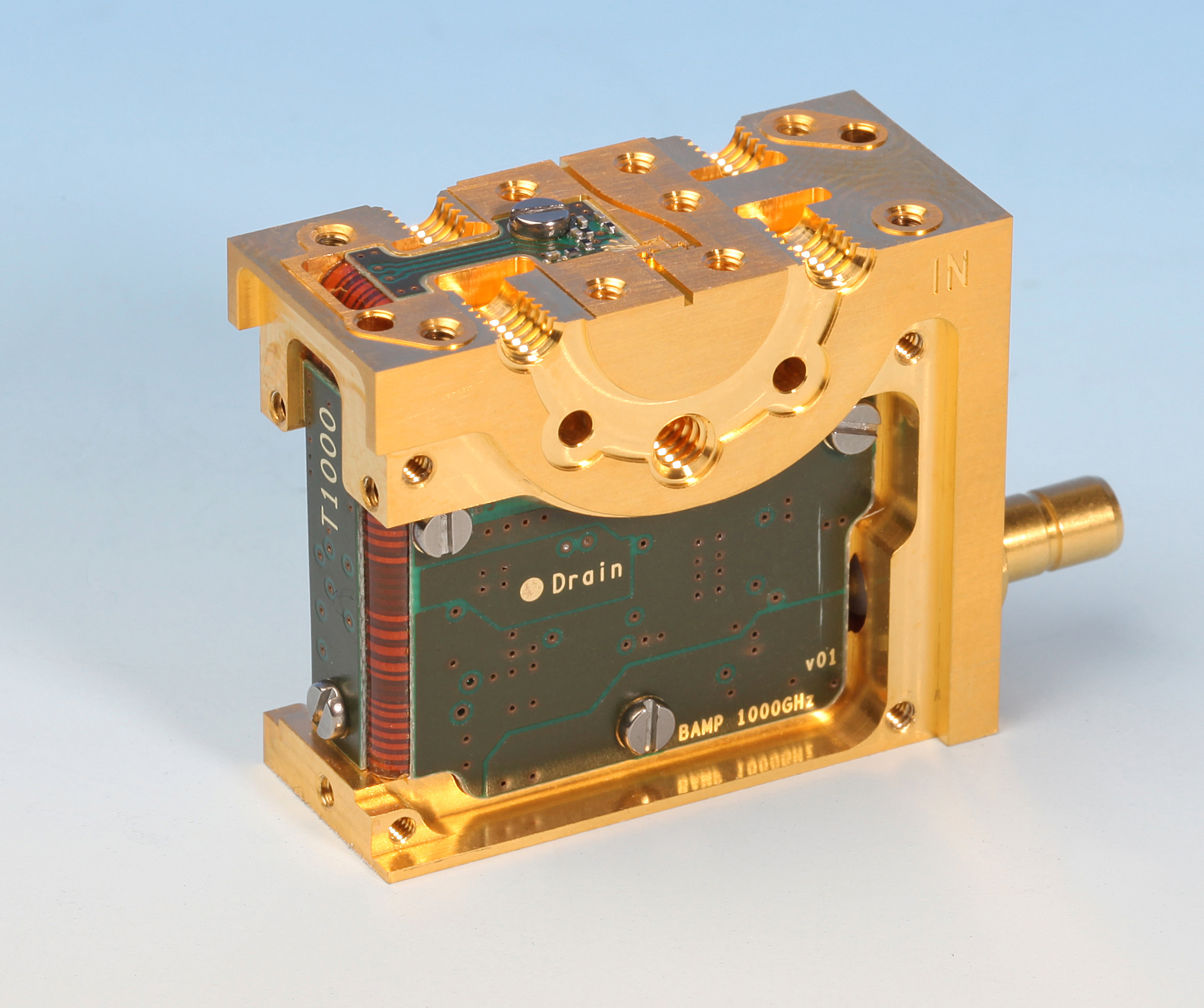 Microwave amplifier module of Fraunhofer IAF made of brass and circuit boards without housing